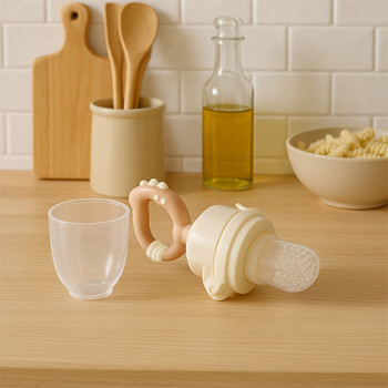 BABYONO Hryzačka na podávanie jedla Dino béžová 6m+